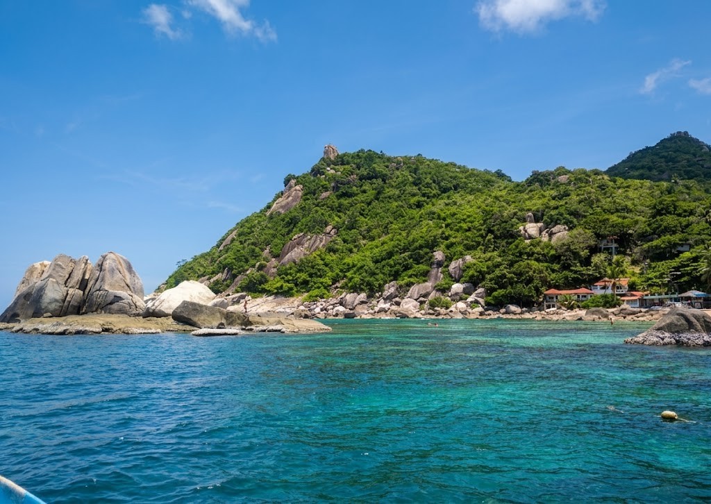 Dramatic rocky bay of Tanote with boulders and turquoise water